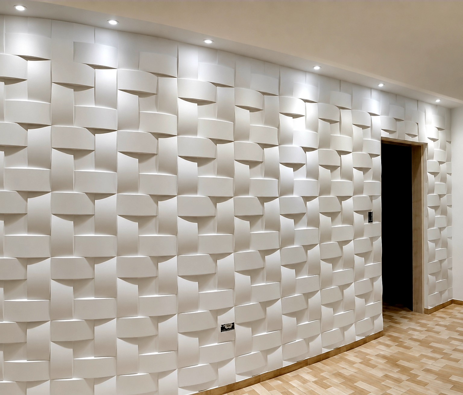 Parede com revestimento tridimensional instalada pela EMS Obras